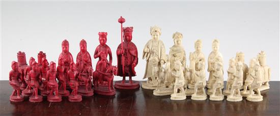 A 19th century Macau carved and stained ivory chess set, king 4.75in.